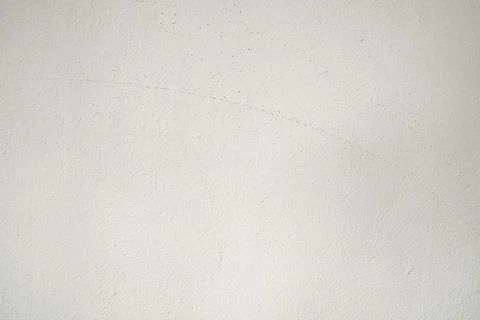 Plaster texture Rough with fine gray cracks for backdrop decoration. Stock Photos