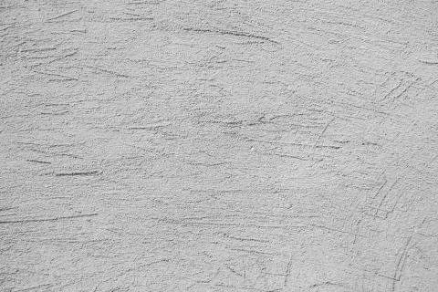 The plaster on the wall. Construction texture. Stock Photos