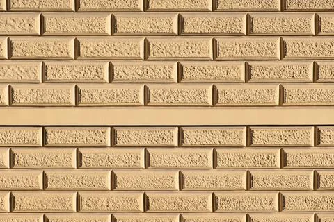 Plaster Wall Formed like Brick wall, architecture decoration in Europe.  Stockfoto's
