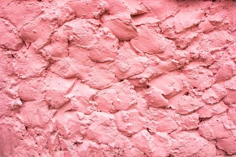Plaster wall painted pink. background texture copyspace Stock Photos