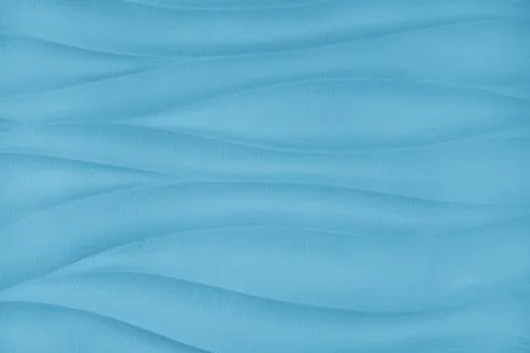 Plaster wall with volumetric relief surface wavy form pattern, blue gypsum .. 스톡 사진