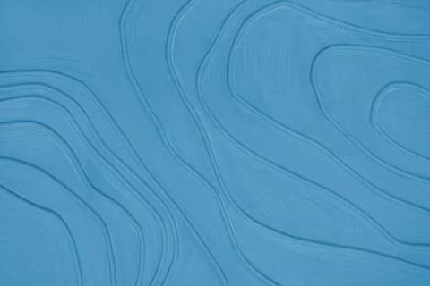 Plaster wall with volumetric relief surface with convex wavy lines, blue gy.. Stock Photos