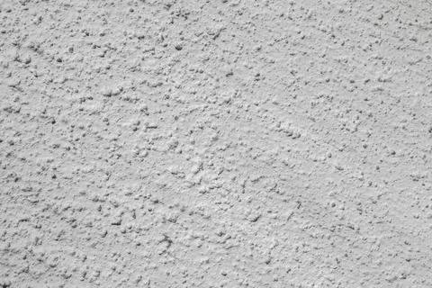 Plaster work on the wall inside or outside the house for background Photos