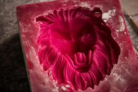 Plaster workshop. Separates the silicone mold from the plaster sculpture of the Stock Photos