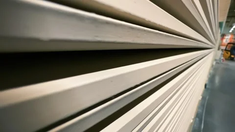 Plasterboard boards or sheetrock stacked in a warehouse of a hardware store Stock Footage 252389031