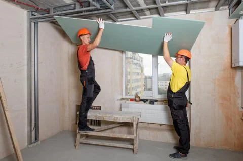 Plasterboard installation on the ceiling. Stock Photos