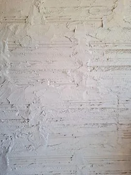 Plastered Brick Wall Texture with Irregular Finish Stock Photos