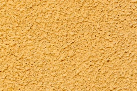 Plastered concrete surface with an uneven rough texture Stock Photos