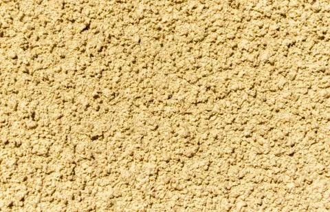 Plastered painted surface in form of scribbled frozen drops of concrete Stock Photos