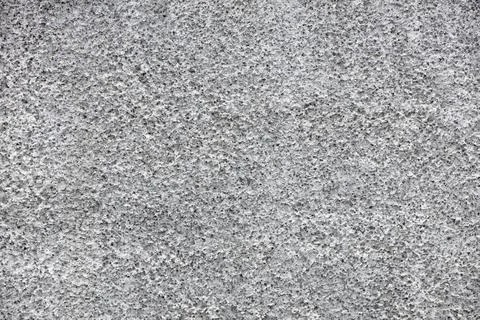 Plastered wall background, grainy prickly plaster texture as background. Stock Photos