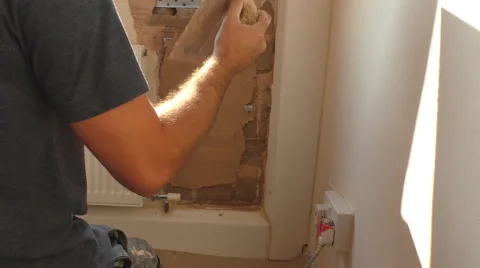 Plasterer applying undercoat plaster Vídeos de archivo 67685970