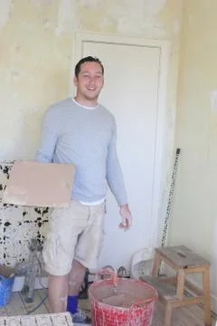 A plasterer with his work tools Stock Photos