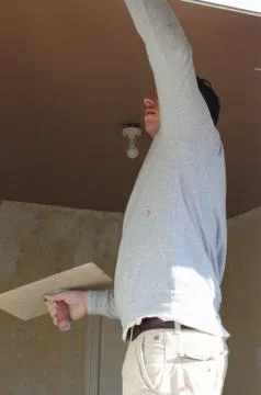 A plasterer plastering Stock Photos