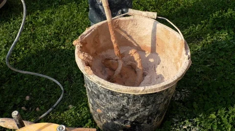 Plasterer preparing plaster mix for plastering 库存影片 67659102