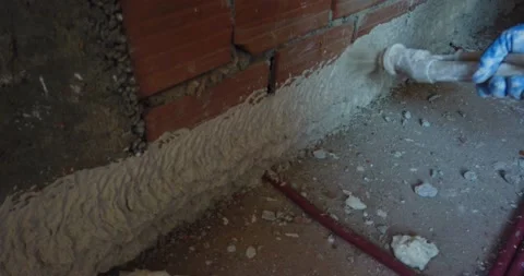 Plastering the interior wall Stock Footage 170257570