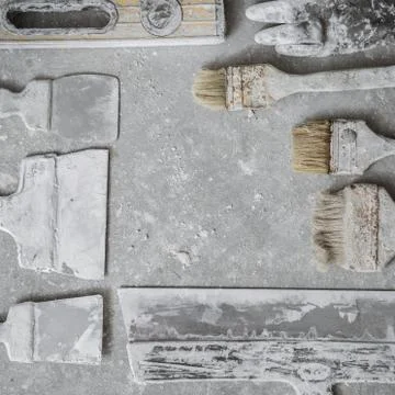 Plastering tools on cement background. Stock Photos