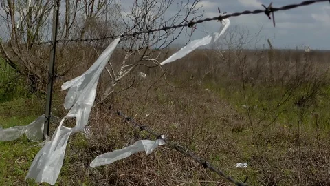 Plastic and garbage pollution concept with shopping bags Video stock 127645016