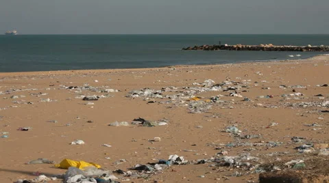 Plastic and nylon polluted beach Stock Footage 60647385