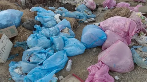 Plastic and other garbage pollutes the desert of Egypt, Marsa Alam, Africa Stock Footage 257324221