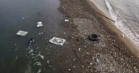 Plastic and Trash in our Ocean Drone Shot Stock Footage 106237659