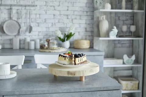 Plastic artificial cakes pieces in the studio cuisine. Food shooting concept Stock Photos