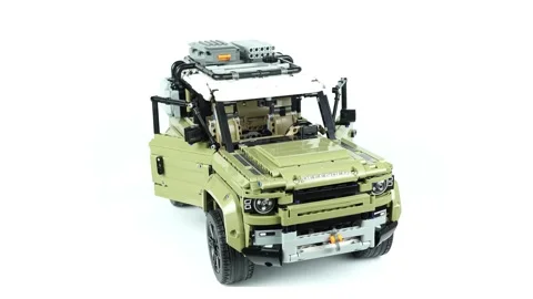 Plastic Assembled Model From Box To Finished Jeep Model. Stock Footage 273681849