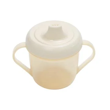 Plastic baby sippy cup with two handles isolated on white background. Empty t Stock Photos