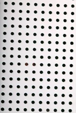 Plastic background with holes Stock Photos