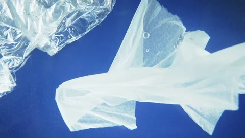 Plastic bag and tissue paper floating under water. copy space Stock Footage 126826831