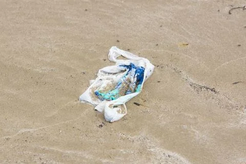 Plastic Bag on the Beach Stock Photos
