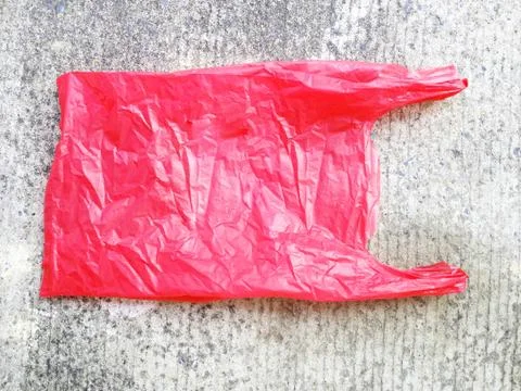 Plastic bag on cement floor Stock Photos
