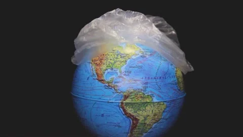 A plastic bag covers the globe of the Earth. Stock Footage 151344995