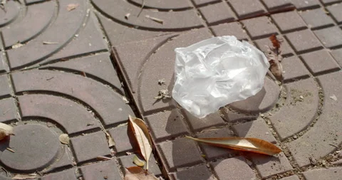 Plastic bag was left on the floor.Garbage is not thrown away properly. Stock Footage 297892077