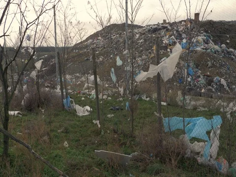 Plastic bags and other garbage in landscape Stock-Footage 83858450