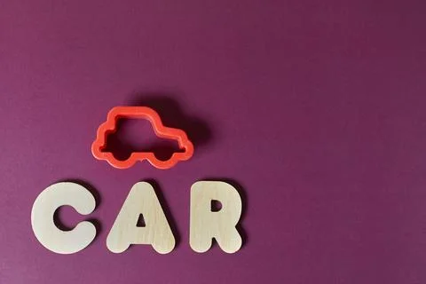Plastic baking dish in the shape of a machine and the inscription Car Stock Photos