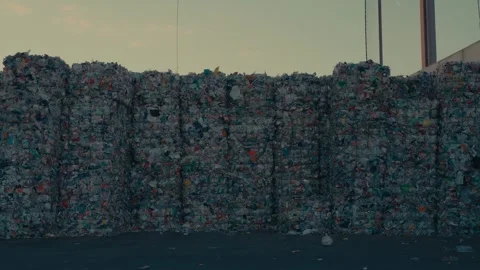 Plastic Bales Stacked in a Storage Yard at a Industrial Recycling Facility 库存影片 331166557