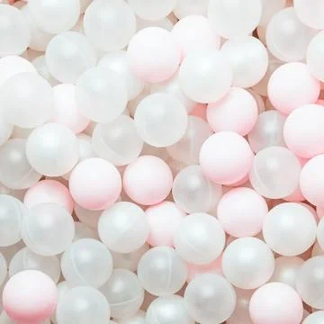 Plastic balls background for dry pool, pale pink Stock Photos