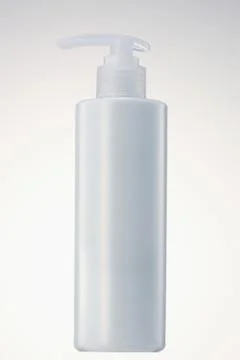 Plastic based white pumping container. Stock Photos