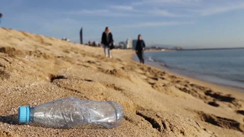 Plastic on the beach Stock Footage