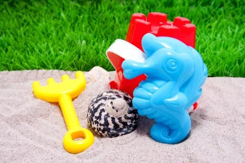 Plastic beach toys Stock Photos