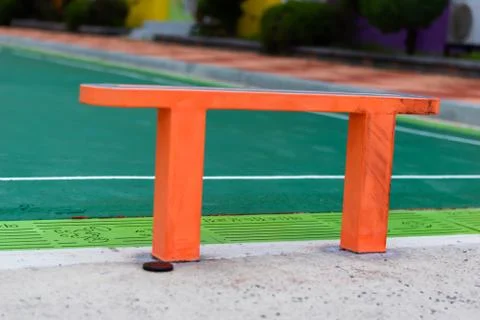 Plastic bench in the ground 库存照片