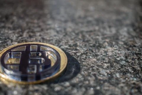 Plastic bit coin with marble background 库存照片
