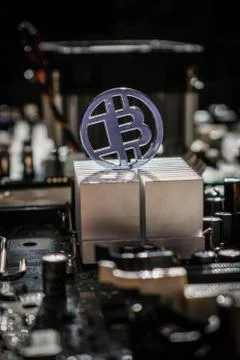 Plastic bit coin with technology and electronic background Fotos de archivo