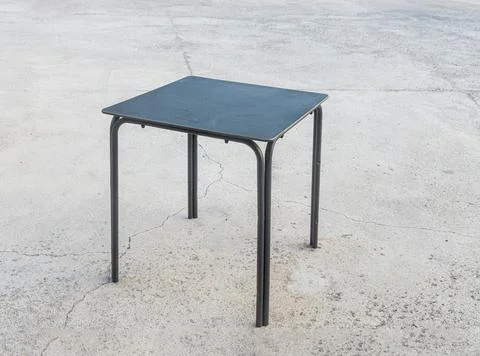 Plastic black table on the gray background Stock Photos