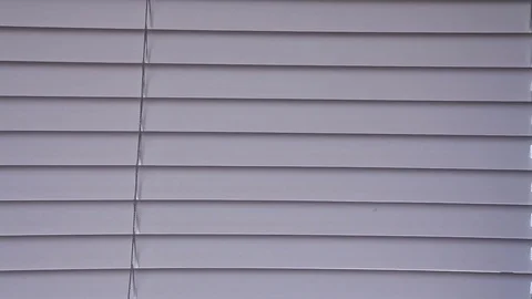 Plastic blinds rise on the window Stock Footage 73448680