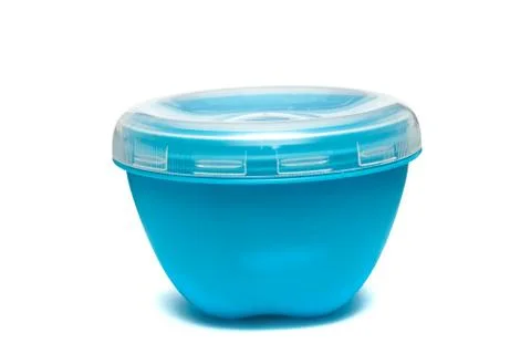 Plastic blue container with lid close up, isolated Fotos de archivo