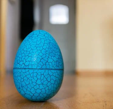 Plastic blue Easter egg Stock Photos