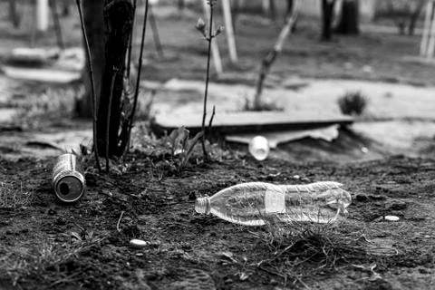 Plastic bottle and garbage scattered on the street Stock Photos