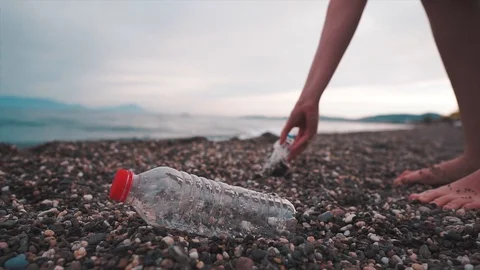 Plastic bottle on beach. Environmental trash, waste. Cause of global warming.  Stock Footage 112267074