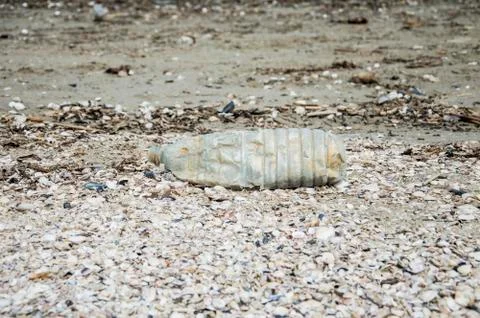 Plastic bottle on the beach Stock Photos